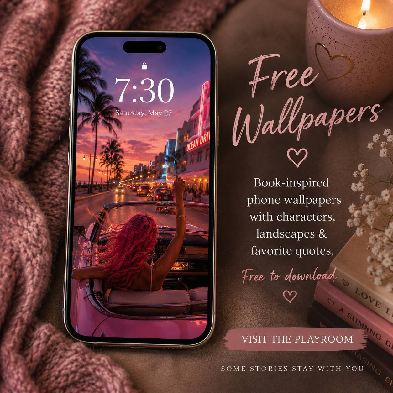 Phone showing an Addie Sloan wallpaper surrounded by pink flowers